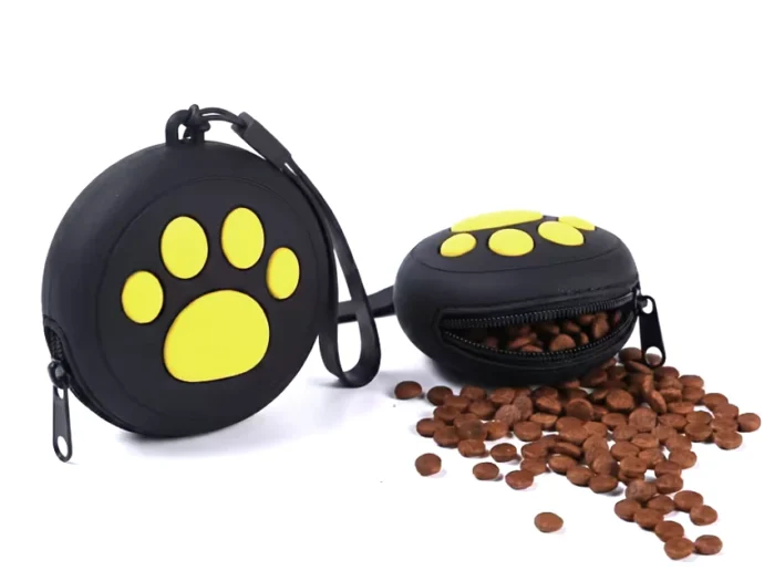Silicone treat pouch with paw print design.